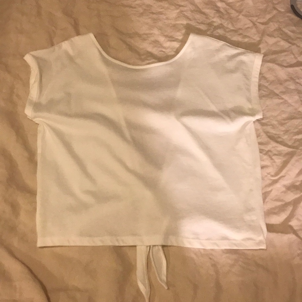 backless tshirt. NEVER WORN